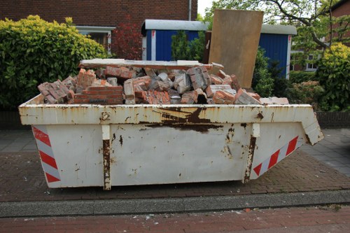 Commercial waste removal truck operating in Tooting